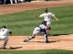 Mark Ellis is... OUT at the plate!
