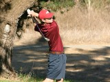 Full release on a swing from the rough.
