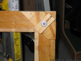 Back of inner frame, this piece slides up to hold the monitor in place